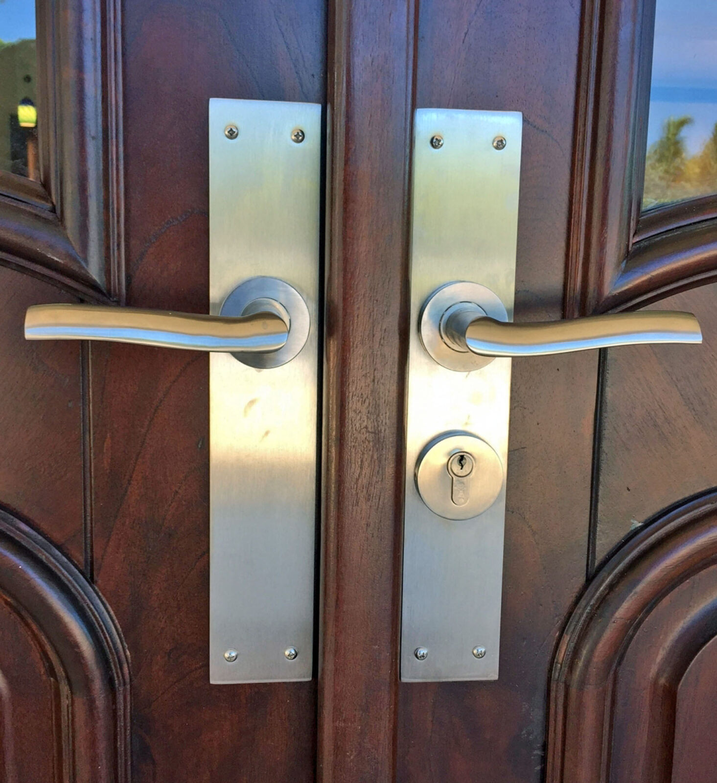 STAINLESS STEEL KEY COLONY HANDLES.